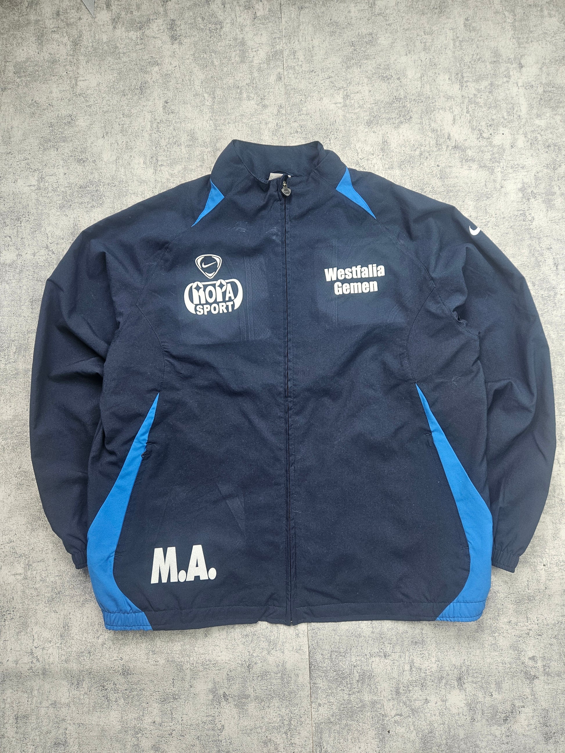 Rarer Nike Wesfalia Trainingsanzug in Größe L, schwarzer Nike Tracksuit mit weißen Akzenten, bequem und stylisch für Sport und Freizeit